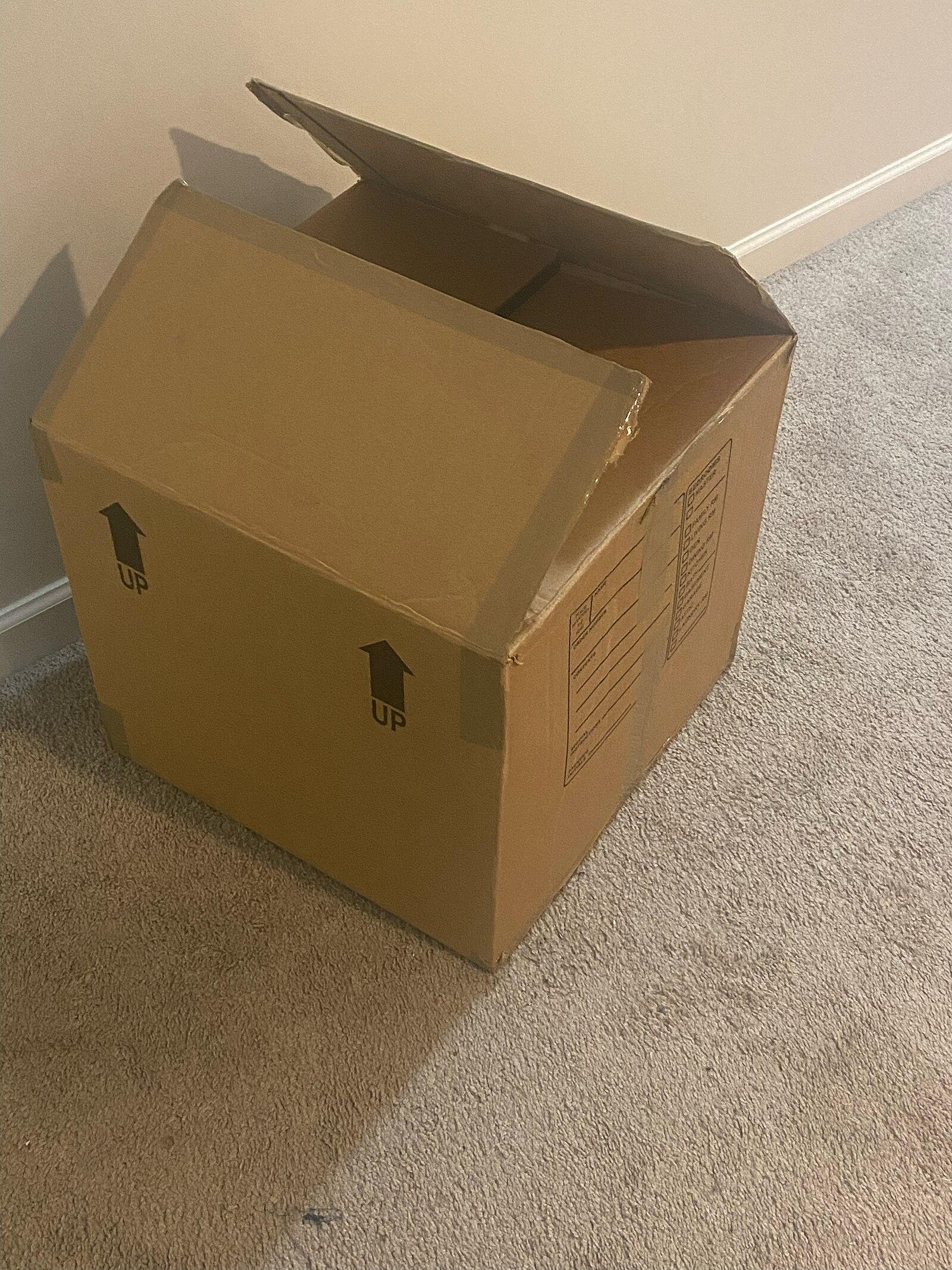 Sealed brown corrugated moving box